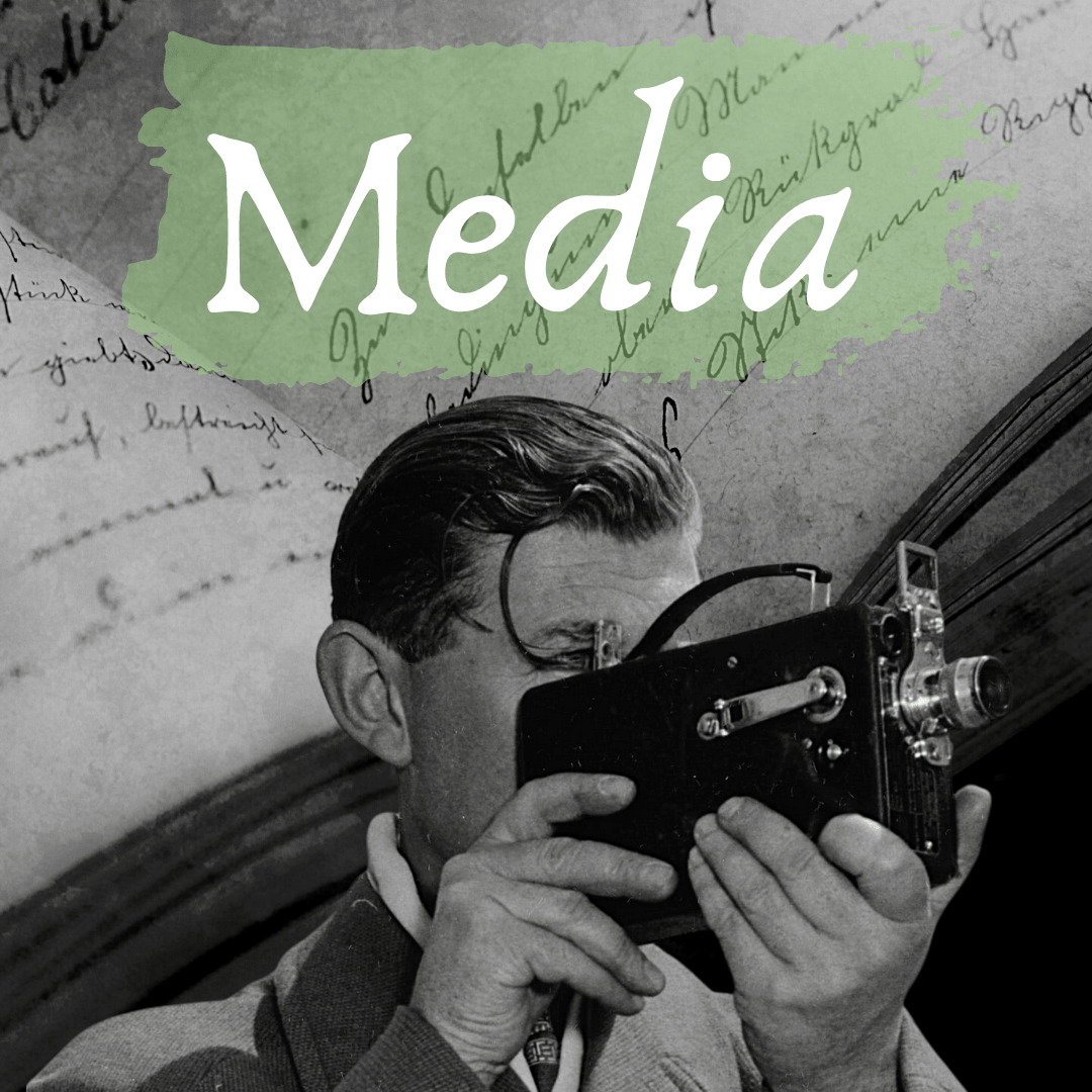 media with black and white image of photographer and his camera